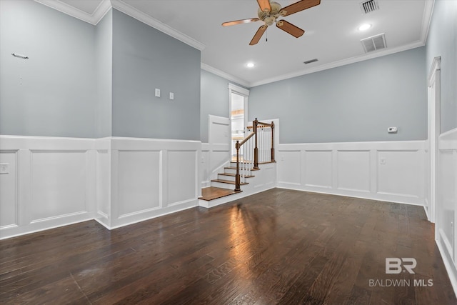 unfurnished room featuring ceiling fan, crown molding, and dark wood-type flooring