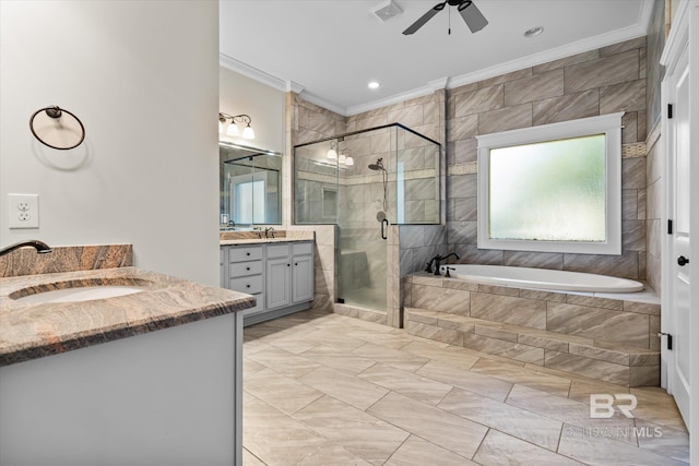 bathroom with vanity, crown molding, ceiling fan, and independent shower and bath