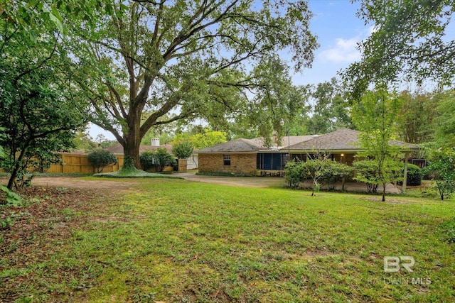 view of yard featuring fence