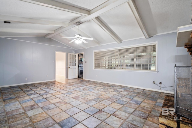 unfurnished living room with a textured ceiling, ceiling fan, wood walls, and vaulted ceiling with beams