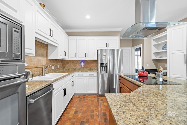 kitchen featuring backsplash, island exhaust hood, stainless steel appliances, and crown molding