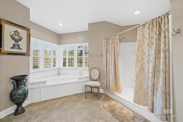 full bath featuring recessed lighting, a bath, and a shower stall