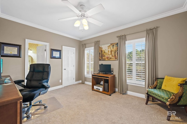 home office with crown molding, carpet, and a wealth of natural light