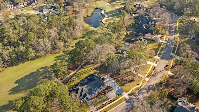 bird's eye view with a residential view and a water view