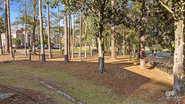 view of property's community with fence