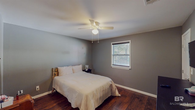 bedroom featuring dark wood-type flooring and ceiling fan