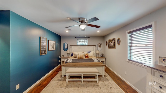 bedroom with ceiling fan and light wood-type flooring