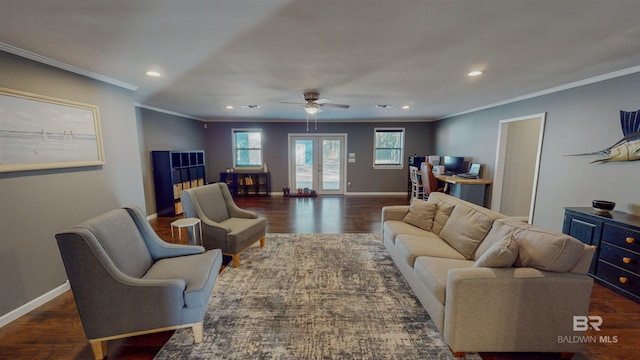 living room featuring ceiling fan, dark wood-type flooring, and crown molding