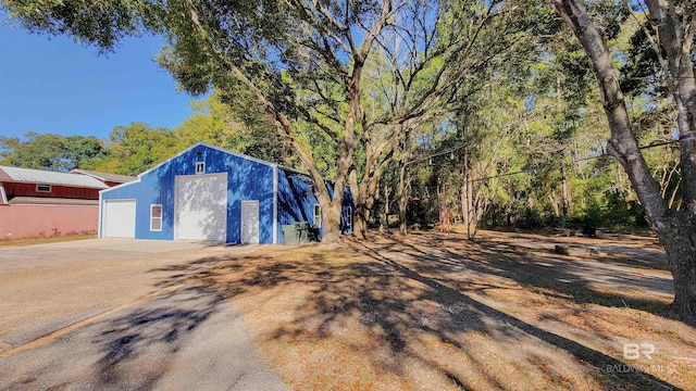 exterior space featuring a garage