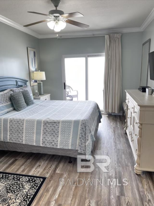 401 E Beach Blvd Unit 507, Gulf Shores, AL 36542 - bedroom with wood finished floors, ornamental molding, and a ceiling fan