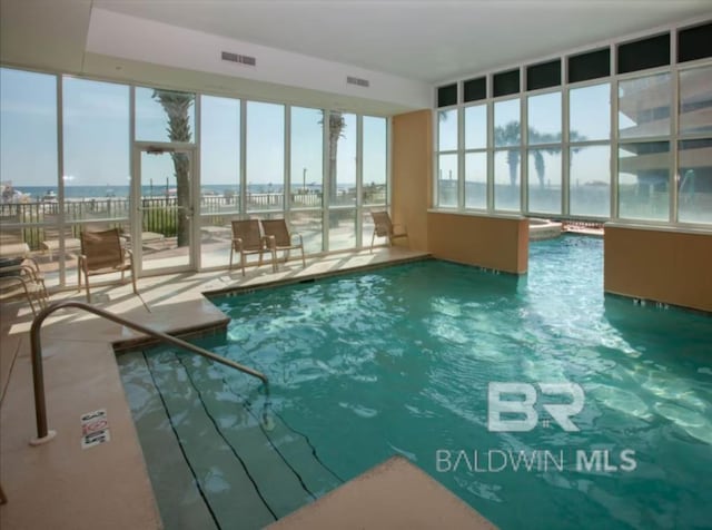 401 E Beach Blvd Unit 507, Gulf Shores, AL 36542 - indoor community pool featuring a water view