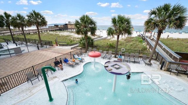 401 E Beach Blvd Unit 507, Gulf Shores, AL 36542 - community pool with a water view and a patio area