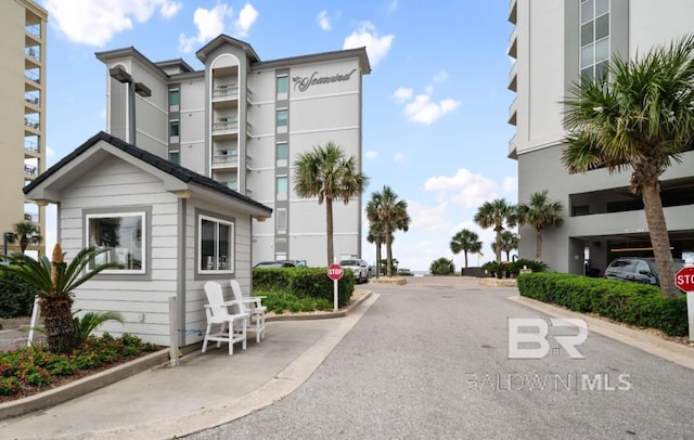 401 E Beach Blvd Unit 507, Gulf Shores, AL 36542 - view of asphalt road with traffic signs