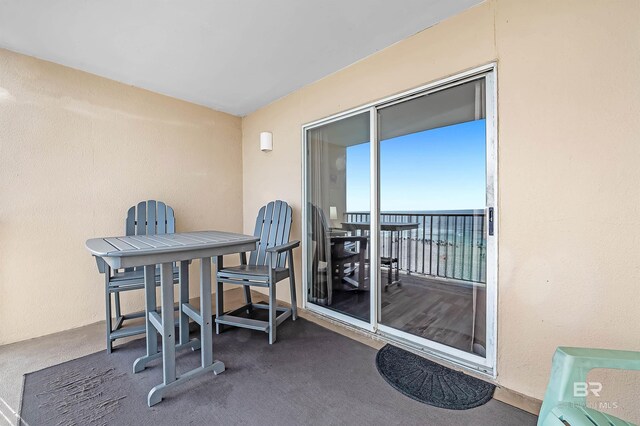 24114 Perdido Beach Blvd Unit 402, Orange Beach, AL 36561 - view of patio featuring a balcony