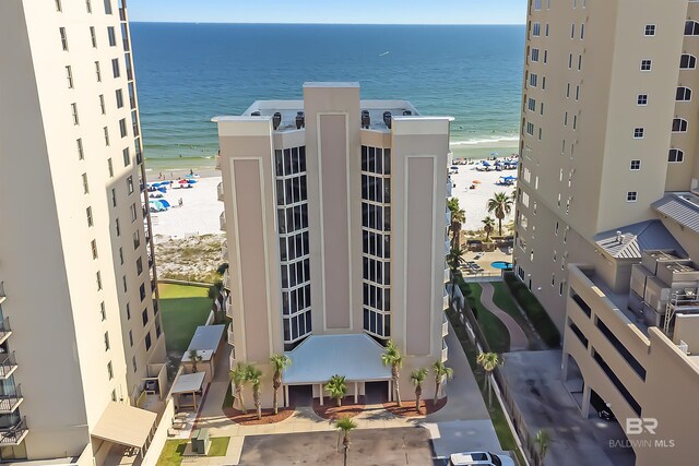 24114 Perdido Beach Blvd Unit 402, Orange Beach, AL 36561 - view of building exterior featuring a water view and a view of the beach