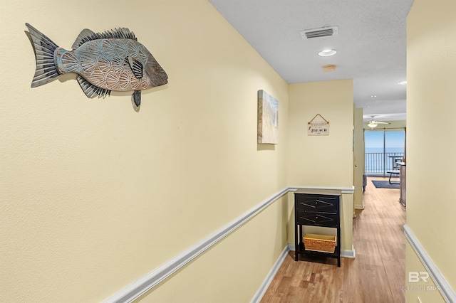 24114 Perdido Beach Blvd Unit 402, Orange Beach, AL 36561 - hall with light hardwood / wood-style floors
