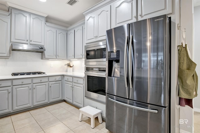 kitchen with gray cabinetry, stainless steel appliances, and light tile patterned flooring