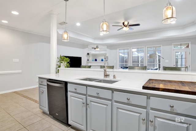 kitchen featuring sink, a raised ceiling, ceiling fan, gray cabinets, and dishwashing machine