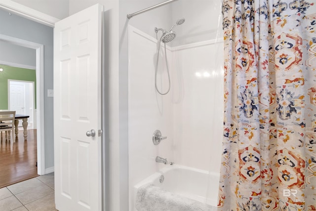 bathroom with shower / tub combo and tile patterned floors