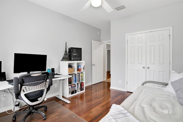 office featuring dark wood-type flooring and ceiling fan