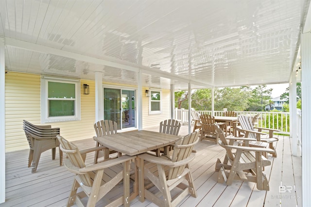 wooden deck with outdoor dining area