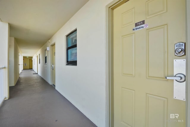 doorway to property with stucco siding