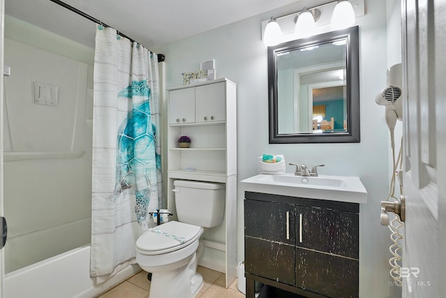 bathroom with vanity, shower / bath combo, tile patterned flooring, and toilet