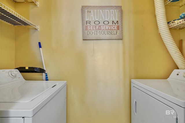 laundry room featuring laundry area and washing machine and dryer