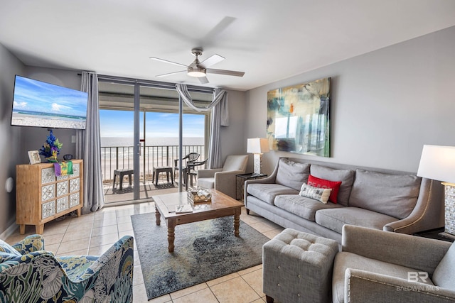 tiled living room featuring ceiling fan