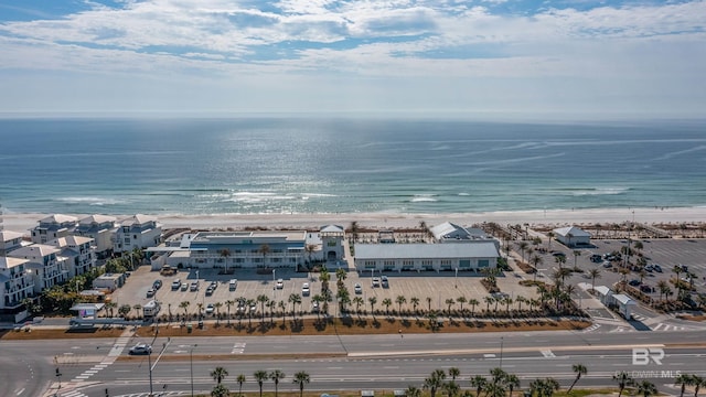 aerial view featuring a water view and a beach view