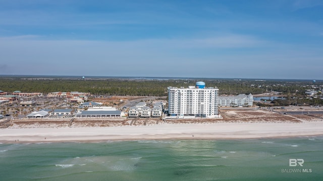 birds eye view of property featuring a view of the beach and a water view