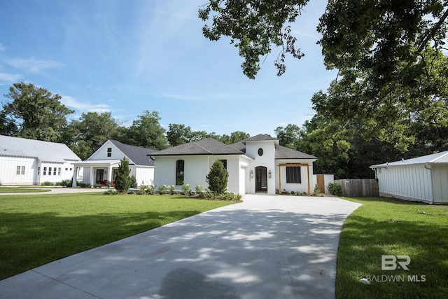 view of front of house with a front lawn