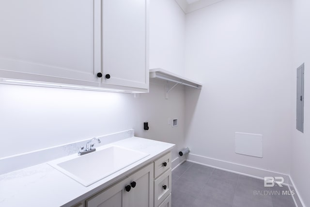 clothes washing area with cabinets, washer hookup, sink, hookup for an electric dryer, and electric panel