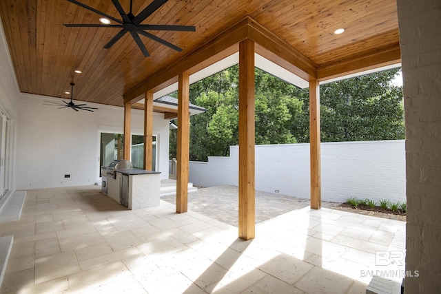 view of patio / terrace with grilling area, ceiling fan, and area for grilling