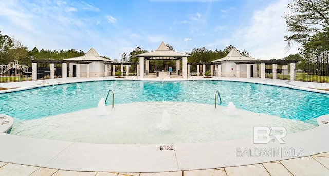 view of pool featuring a gazebo, pool water feature, and a patio area