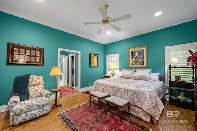 137 Mcintosh Bluff Rd, Fairhope, AL 36532 - bedroom featuring baseboards, crown molding, wood finished floors, recessed lighting, and ceiling fan