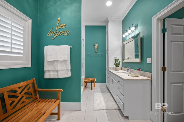 137 Mcintosh Bluff Rd, Fairhope, AL 36532 - full bathroom with tile patterned flooring, ornamental molding, vanity, and baseboards