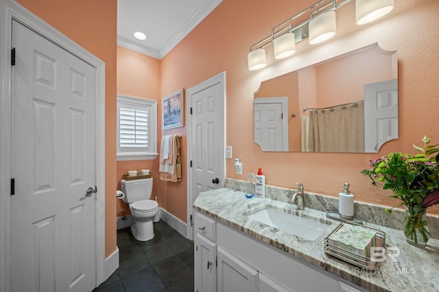 137 Mcintosh Bluff Rd, Fairhope, AL 36532 - full bath with toilet, tile patterned floors, ornamental molding, vanity, and baseboards