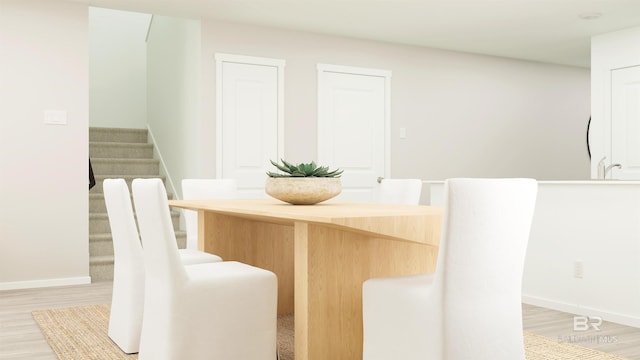 dining room with light hardwood / wood-style floors