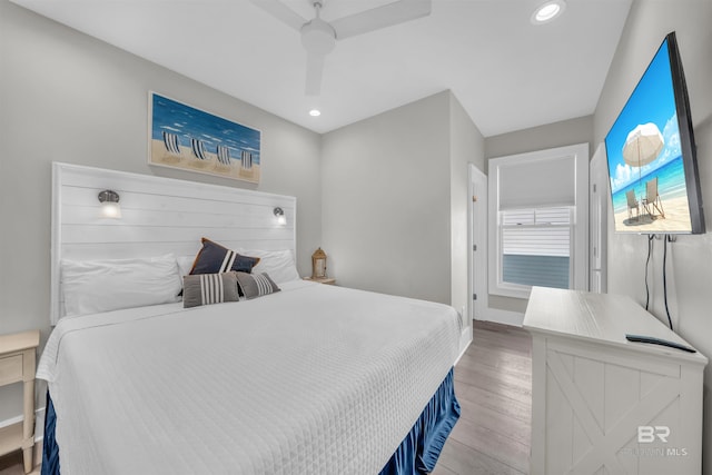 1592 W Beach Blvd, Gulf Shores, AL 36542 - bedroom with light hardwood / wood-style floors and ceiling fan