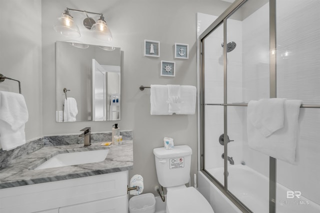 1592 W Beach Blvd, Gulf Shores, AL 36542 - full bathroom with toilet, enclosed tub / shower combo, and vanity