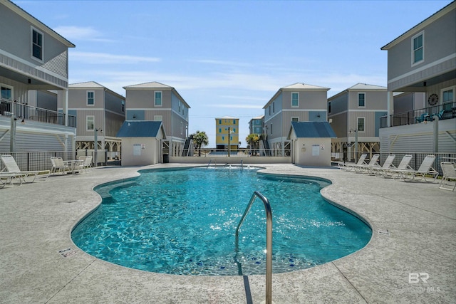 1592 W Beach Blvd, Gulf Shores, AL 36542 - view of swimming pool with a patio