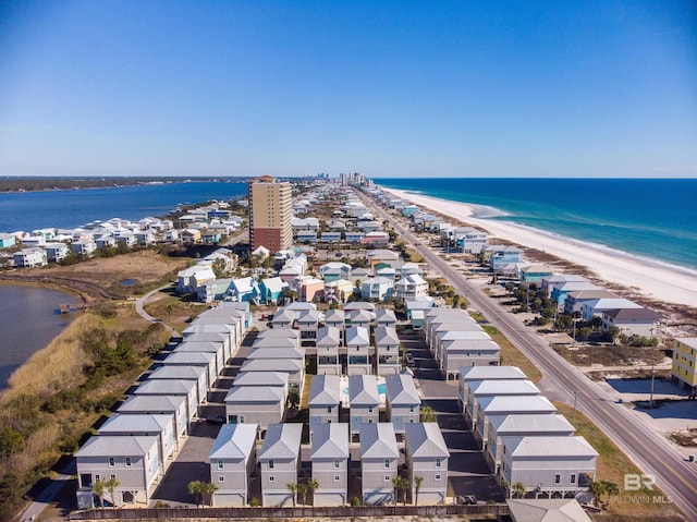 1592 W Beach Blvd, Gulf Shores, AL 36542 - drone / aerial view featuring a water view and a beach view