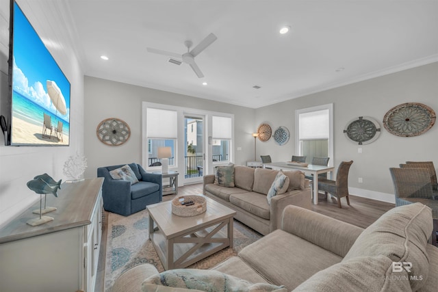 1592 W Beach Blvd, Gulf Shores, AL 36542 - living room featuring ceiling fan, light hardwood / wood-style flooring, and crown molding