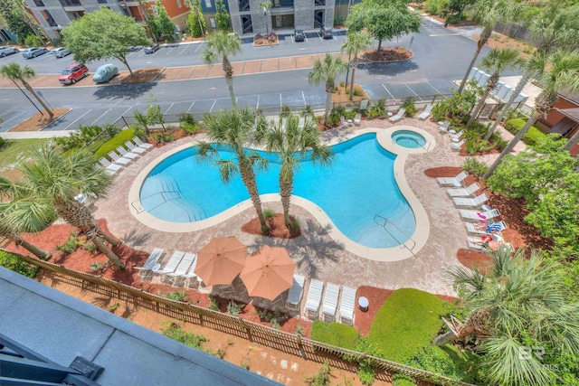 1430 Regency Rd Unit C201, Gulf Shores, AL 36542 - community pool featuring a hot tub