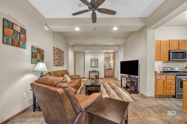 1430 Regency Rd Unit C201, Gulf Shores, AL 36542 - living room featuring ceiling fan and light stone finish flooring