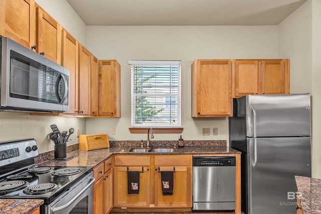 1430 Regency Rd Unit C201, Gulf Shores, AL 36542 - kitchen featuring stainless steel appliances and dark stone counters