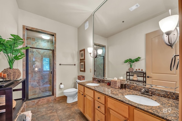 1430 Regency Rd Unit C201, Gulf Shores, AL 36542 - full bathroom with a stall shower, double vanity, and stone finish flooring