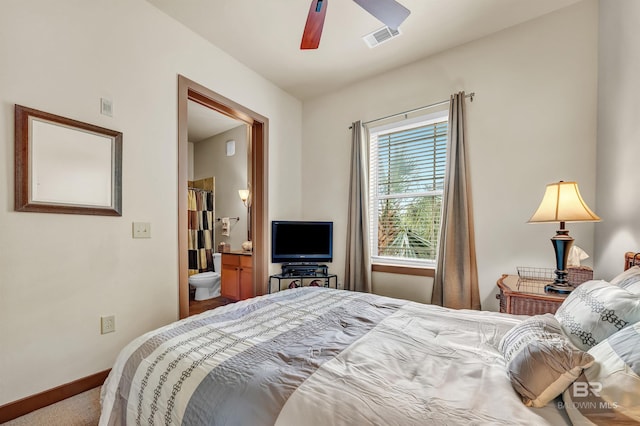 1430 Regency Rd Unit C201, Gulf Shores, AL 36542 - bedroom featuring ensuite bathroom, ceiling fan, and carpet flooring