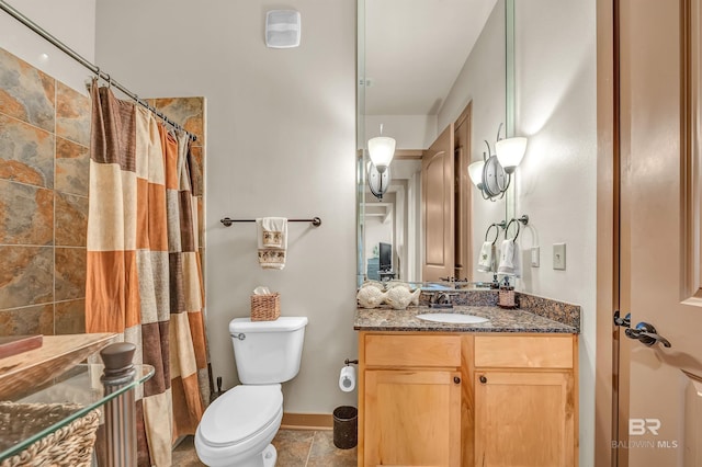 1430 Regency Rd Unit C201, Gulf Shores, AL 36542 - bathroom featuring vanity, a shower with curtain, and stone finish floors
